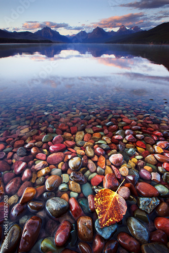 View of multicolored rocks in McDonald lake photo