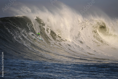 Man surfing on sea wave photo