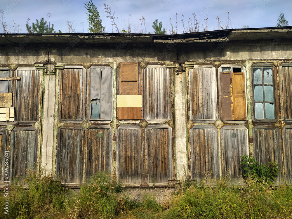 Wooden doors of old two-storey warehouse