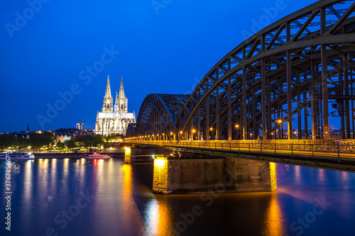 View of Hohenzollern Bridge at night, Cologne, Germany photo