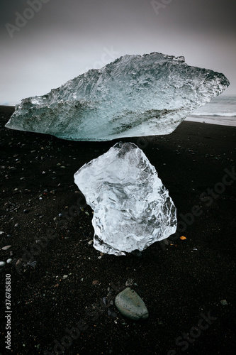 Iceberg on beach near Jokulsarlon lagoon in Skaftafell National Park photo