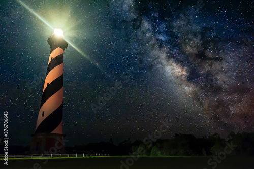 Low angle view of Cape Hatteras Lighthouse against milky way at night