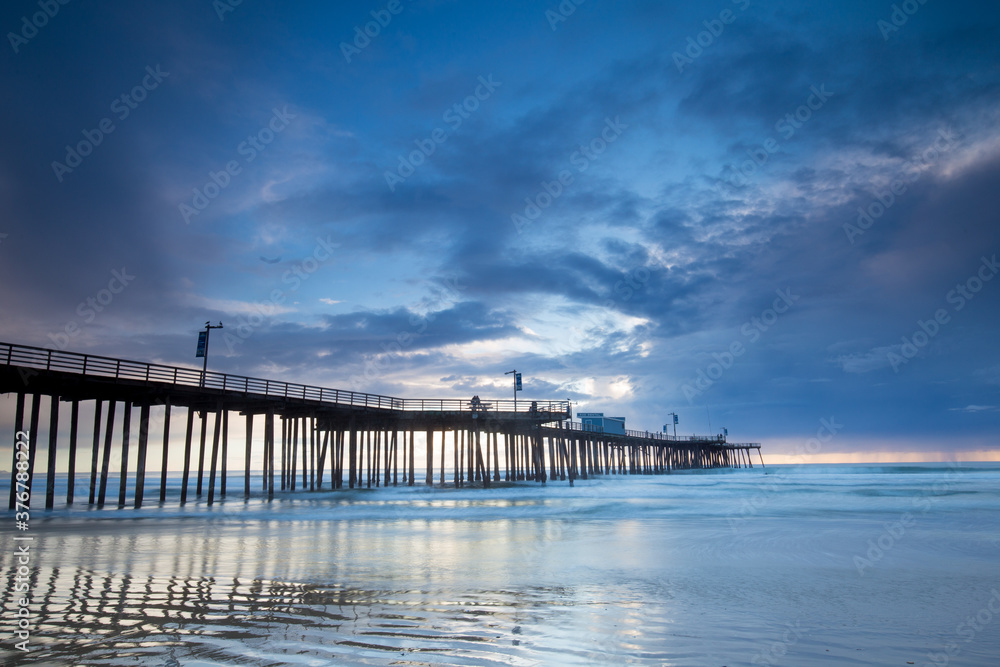 View of Pismo Beach Pier against cloudy sky View of Pismo Beach Pier against cloudy sky