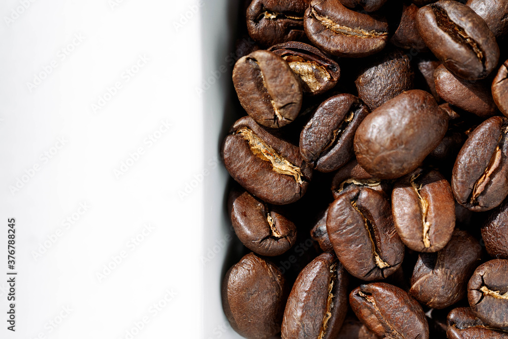 Fototapeta premium Brown roasted coffee beans, background
