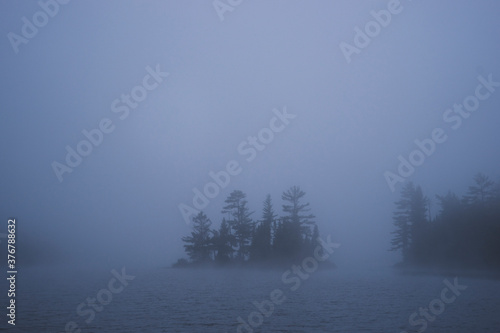Morning fog on Burnt Lake in Boundary Waters Canoe Area Wilderness photo