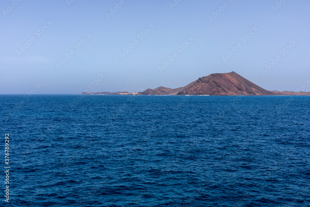 view of Lobos Island in Fuerteventura - desert island on the sea
view of Lobos Island in Fuerteventura - desert island on the sea