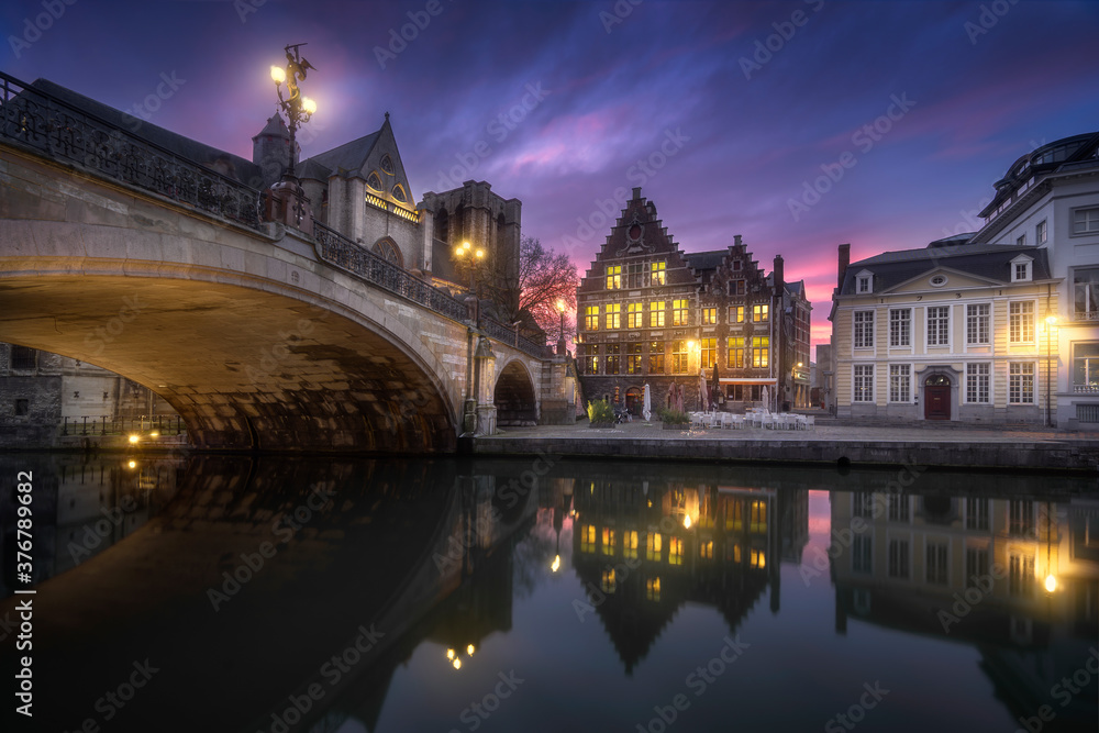 View of St Michael's Bridge and Saint Michael's Church during sunset View of St Michael's Bridge and Saint Michael's Church during sunset