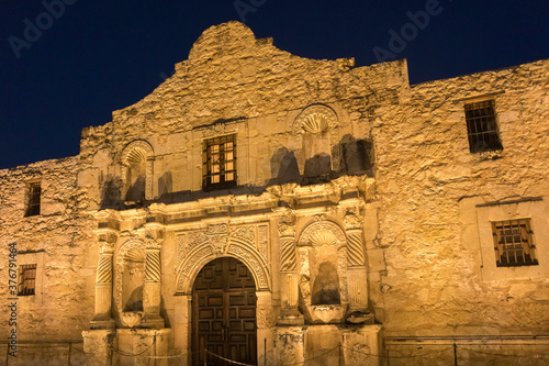 Exterior view of The Alamo at night photo