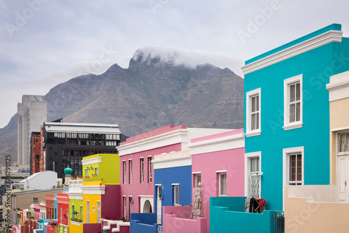 View of colorful houses with Table Mountain in background photo