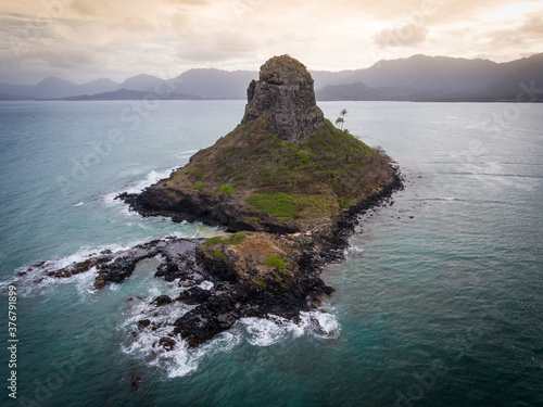 Aerial view of Mokoli_i against cloudy sky photo