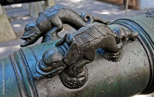 Decorative element of an ancient bronze cannon  Rio de Janeiro  Brazil 
