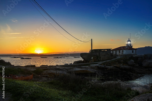 Arousa island lighthouse at sunset