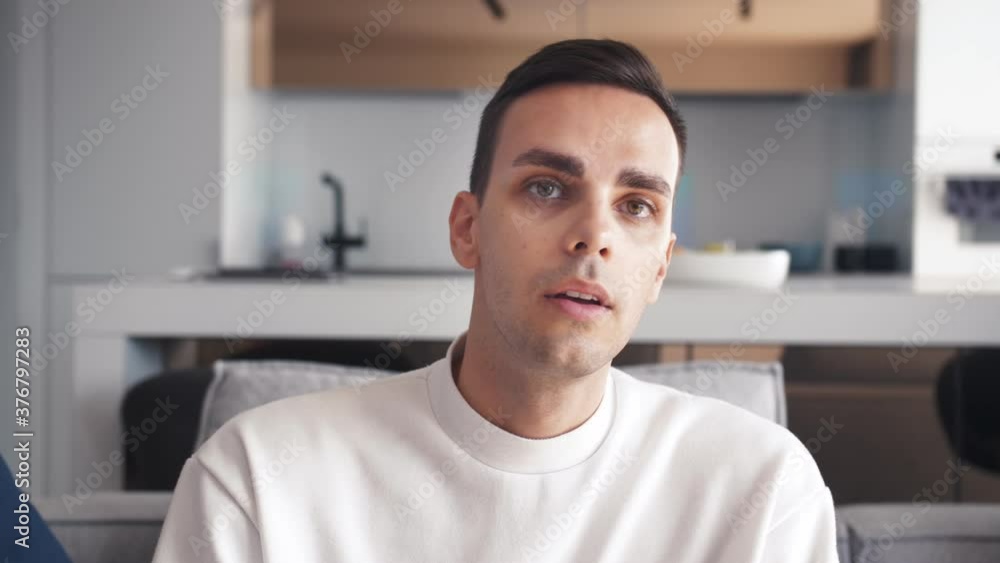 Frustrated caucasian man fan watching how his favorite team is losing or favourite show sad disappointed Frustrated caucasian man fan watching how his favorite team is losing or favourite show sad disappointed