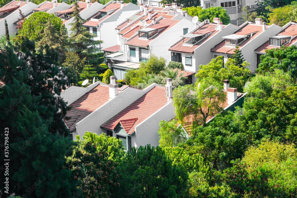 Collective villa houses view in summer aerial view