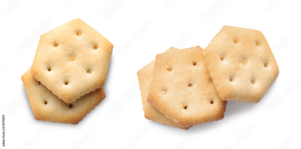 Set of tasty crispy crackers on white background, top view Set of tasty crispy crackers on white background, top view