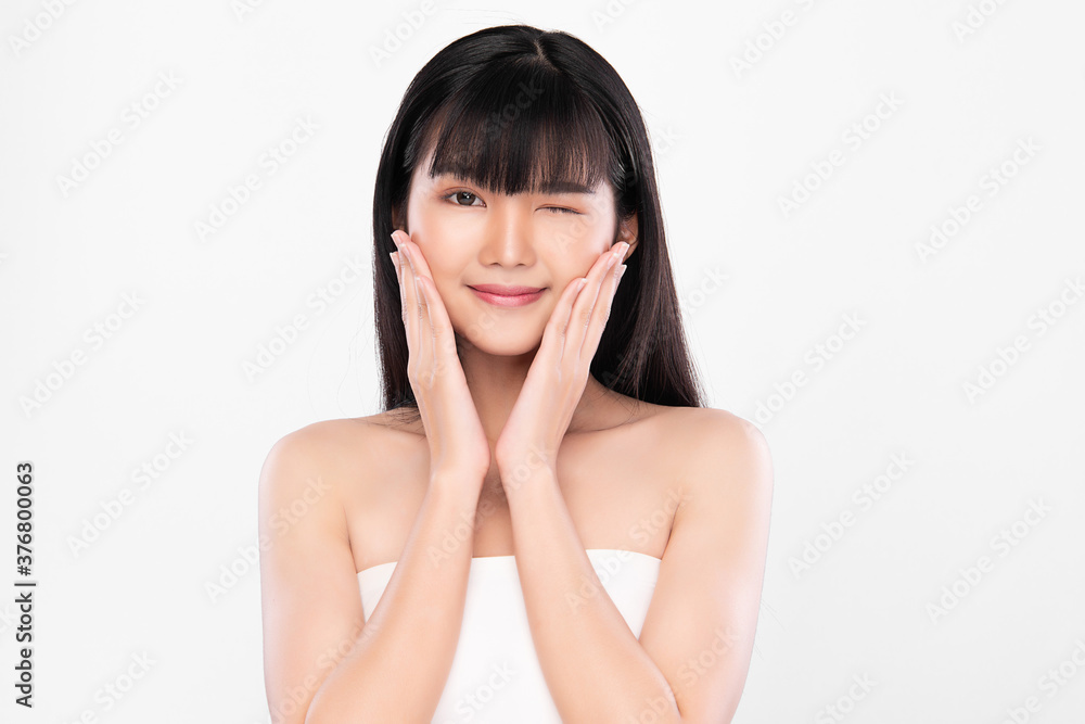 Beautiful Young asian Woman with Clean Fresh Skin on white background, Face care, Facial treatment, Cosmetology, beauty and spa, Asian women portrait Beautiful Young asian Woman with Clean Fresh Skin on white background, Face care, Facial treatment, Cosmetology, beauty and spa, Asian women portrait