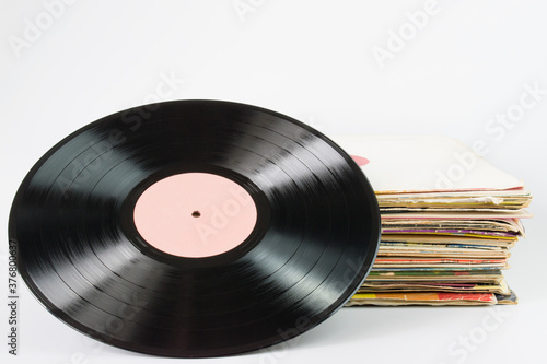 Old retro vinyl records on a white background