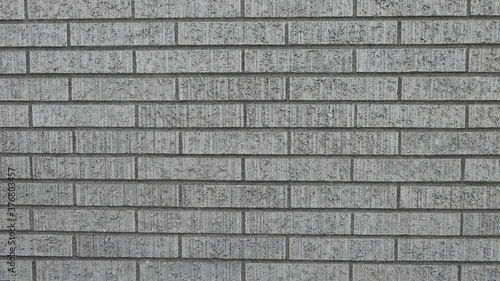 grey brick wall background texture or wallpaper