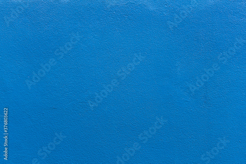 Wall plastered with paint blue colour. image for texture and background.