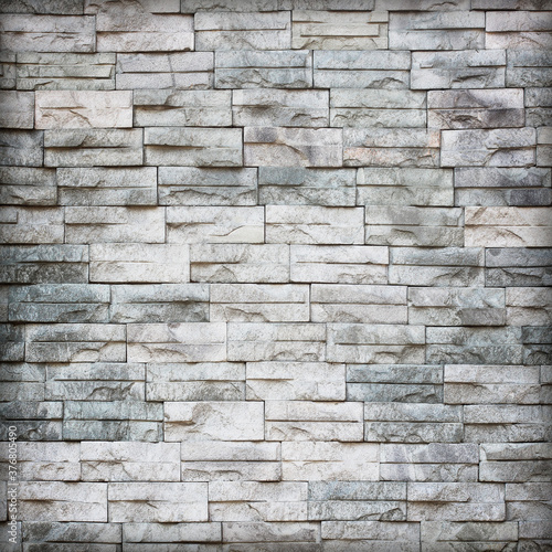 Gray slate wall stone background or texture.
