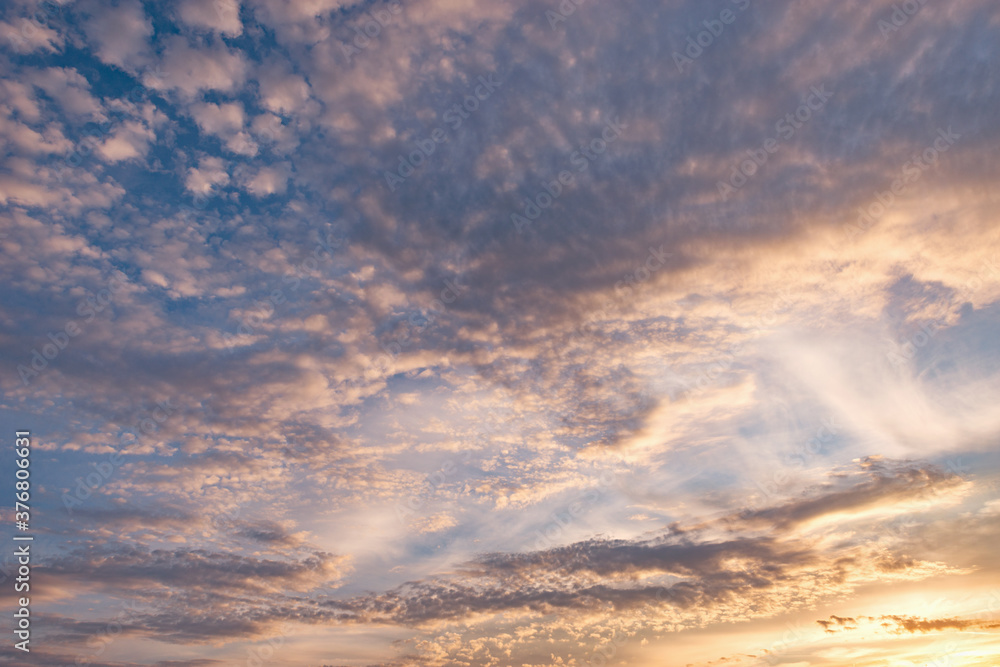 Colorful clouds after rain at sunset time.