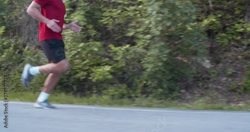 Wallpaper Mural Marathon endurance training, running man, dolly side shot Torontodigital.ca