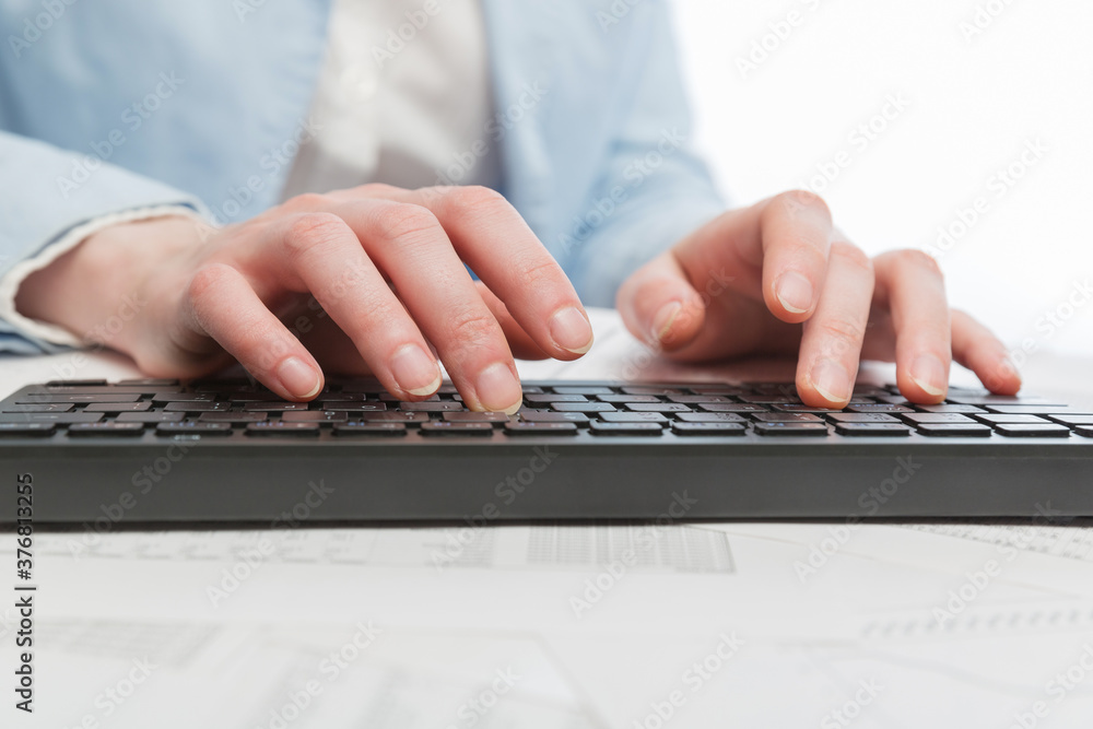 Business woman using computer keyboard Business woman using computer keyboard