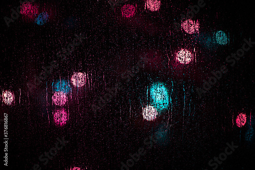 Raining night city street lights bokeh nice background
 (ID: 376816867)