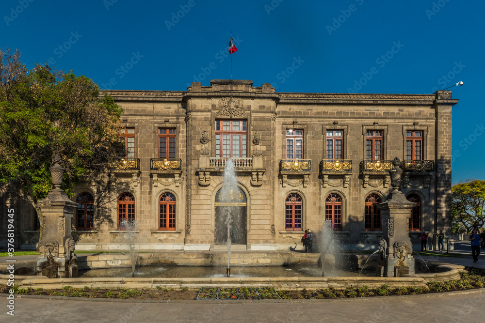 Naklejka premium Exteriors of Chapultepec Castle, Mexico city, Mexico, March 2017. Chapultepec Castle is located on a hill within the Park that bears the same name. in the Castle is located the Museum of the History.