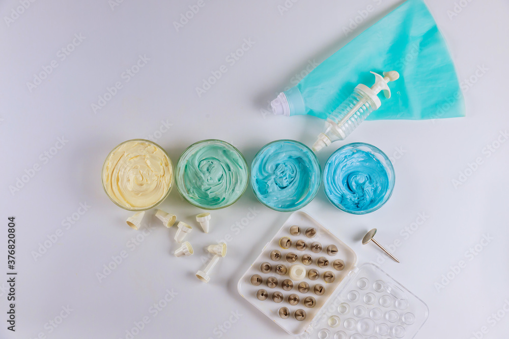 Decoration bag and icing with metallic nozzles. Decoration bag and icing with metallic nozzles.