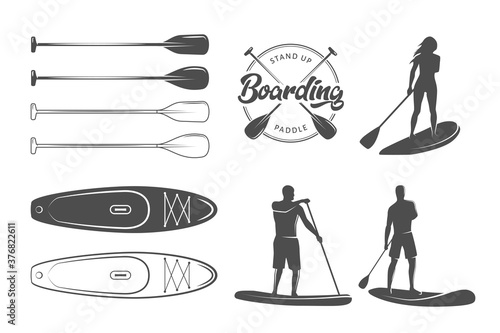 SUP boarding design elements. Stand up paddling stickers and badges. Set of vector emblems with SUP boards, boarder silhouettes and equipment photo