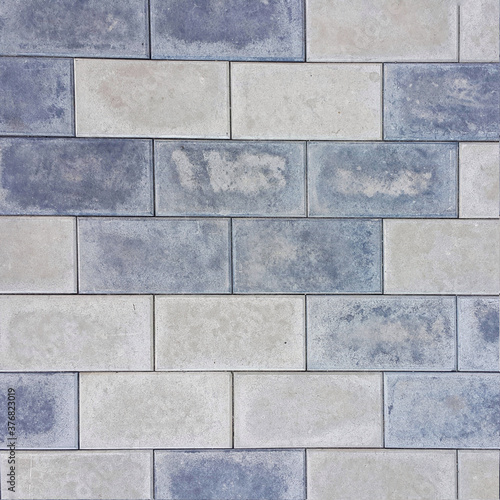 Wallpaper Mural Background of the brickwork. Structural material. For designers. Interior of the building facade. Masonry. Construction industry. The color is gray. Square photo. Torontodigital.ca