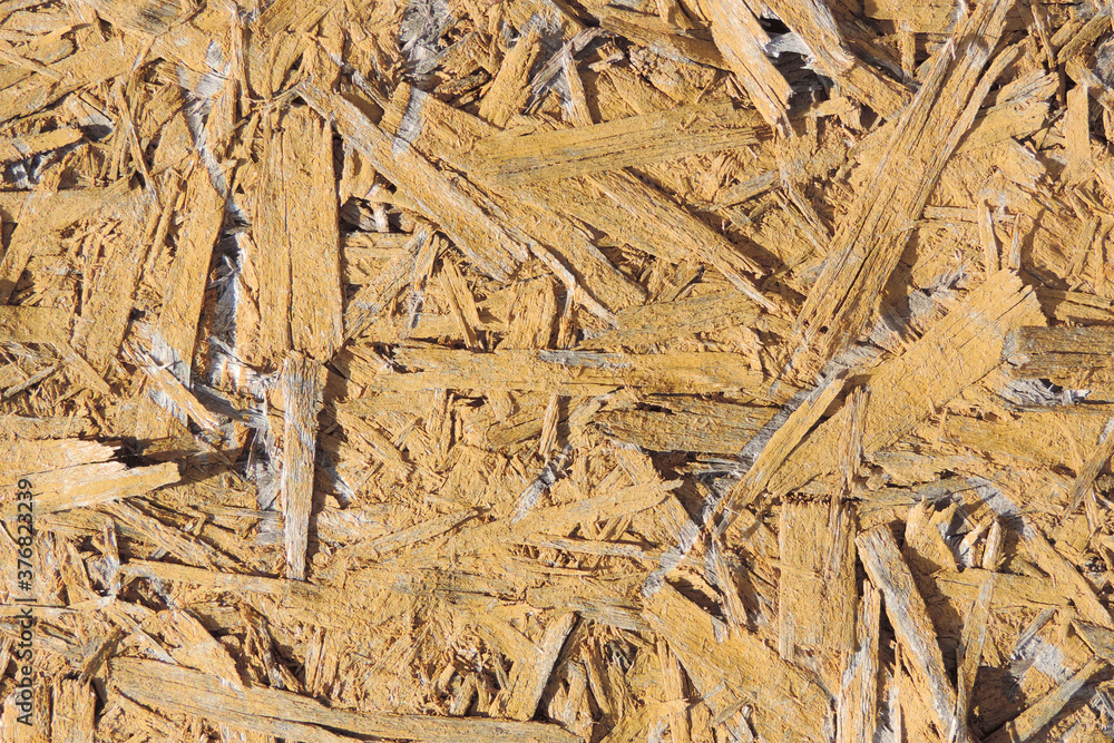 chipboard, close up surface of the pressed wood shavings for wall and floor chipboard, close up surface of the pressed wood shavings for wall and floor