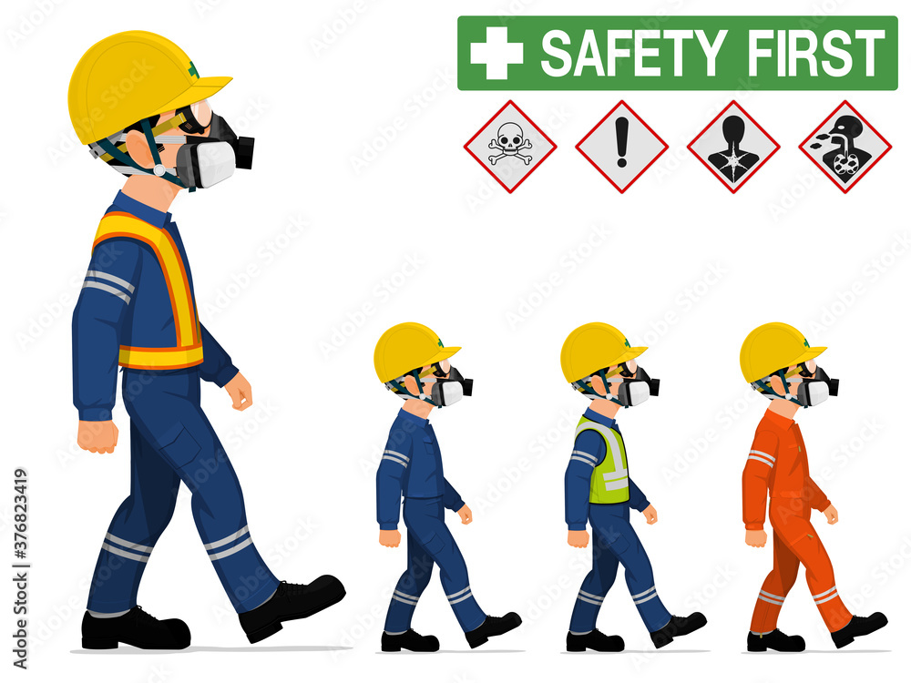 An industrial worker with respirator is walking