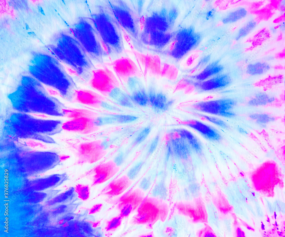 Spiral tie dye pattern in blue skyblue and pink. Boho hippie tie-dye