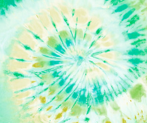 Spiral tie dye pattern wallpaper background in green and tan.
