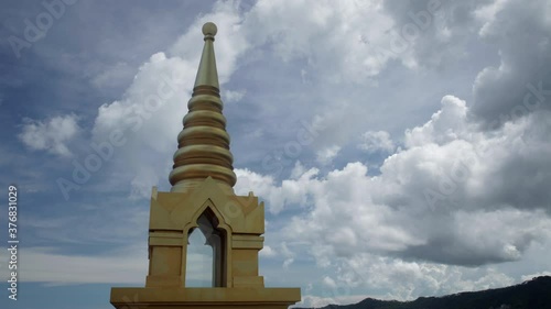 Time lapse from top of pagoda - Spear and sky in mid day light - Koh Samui in Thailand -4K resolution photo