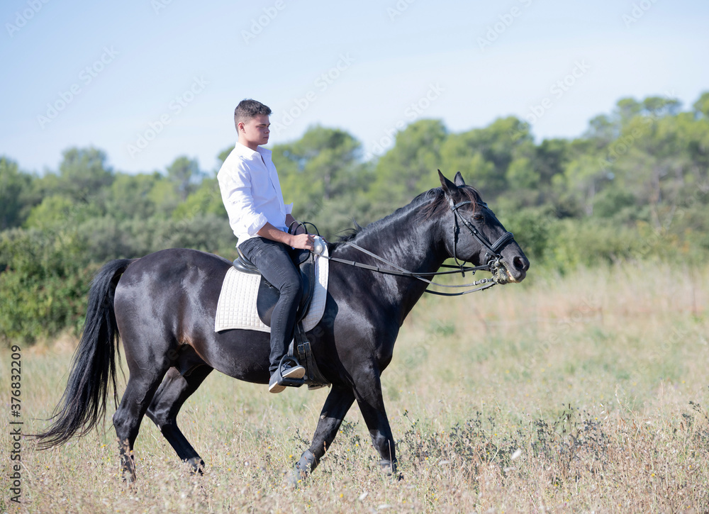 riding teenager and horse