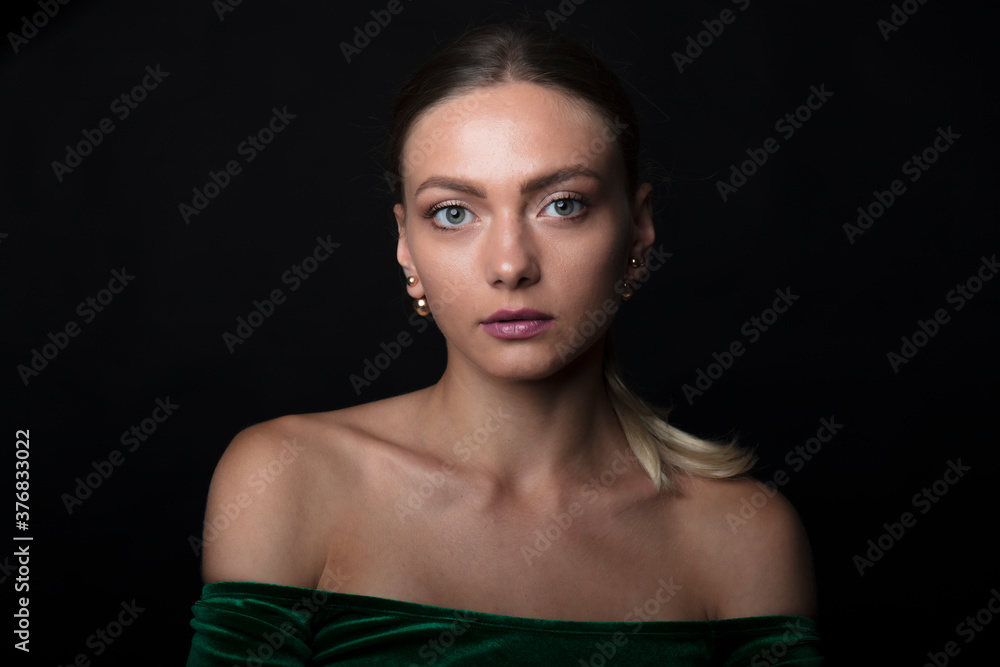 Fototapeta premium portrait of a young woman, shooting in a photo studio
