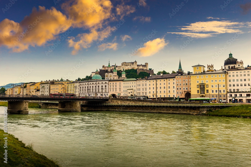 Fototapeta premium Sunset over Salzburg town. Salzach river. Austria.