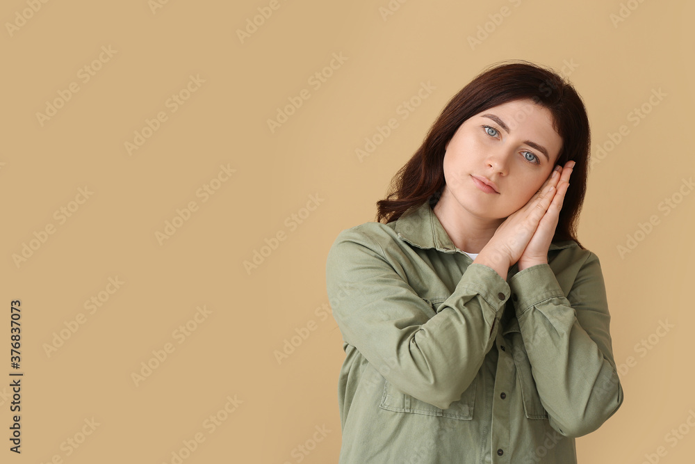 Young deaf mute woman using sign language on color background Young deaf mute woman using sign language on color background