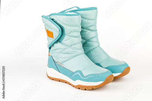 winter blue boots on a white background
