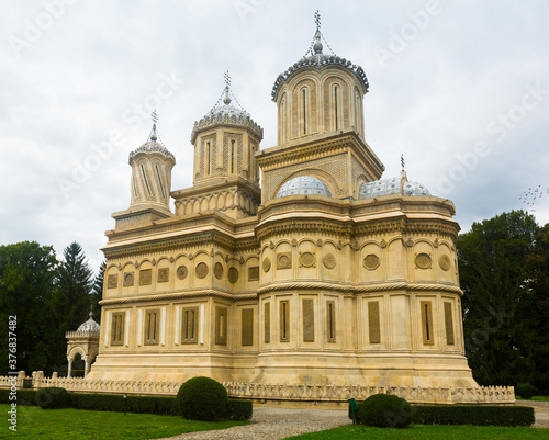 Cathedral in Curtea de Arges is architectural landmark outdoors.