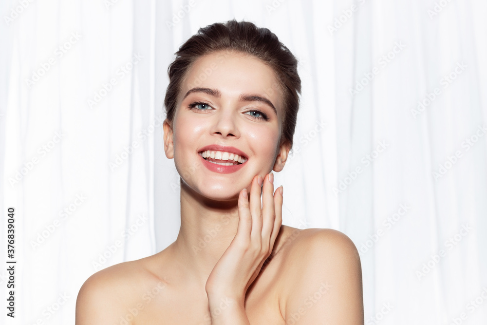 Beautiful well-groomed woman with natural makeup and manicure. Beautiful well-groomed woman with natural makeup and manicure.