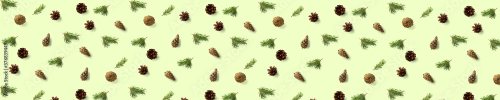 Pine cone Christmas background on green. Pine branches and cones. minimal creative cone arrangement pattern. flat lay, Modern christmas Background. Pine cone Christmas background on green. Pine branches and cones. minimal creative cone arrangement pattern. flat lay, Modern christmas Background.