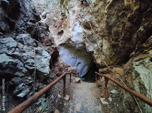 horizontal photo of cave entrance with handrail in Thaailand © a3701027