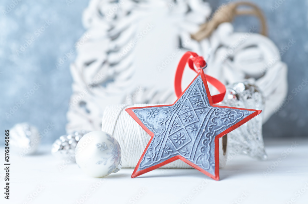 Christmas star on bright wooden background. Close up. 