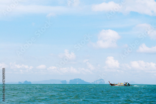 Thai longtail fishing boat in Andaman sea near Koh Lanta island, Krabi, Thailand © PixHound