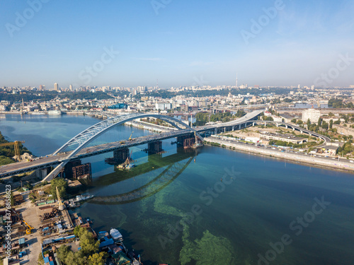 Aerial drone view. A cable-stayed bridge under construction across the Dnieper River in Kiev.