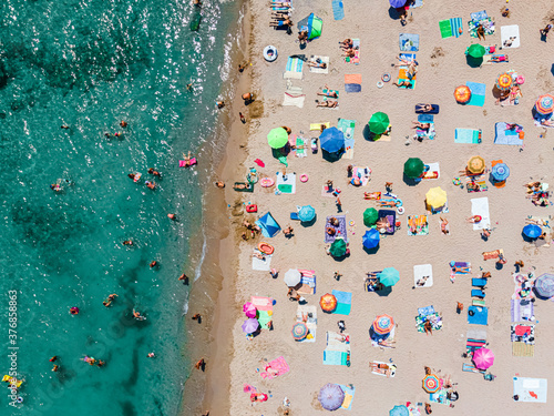 Aerial Ocean Beach Photography, People And Umbrellas On Seaside Beach